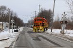 HESR 3414 starts across Carrollton Rd as it continues its slow roll south with 702